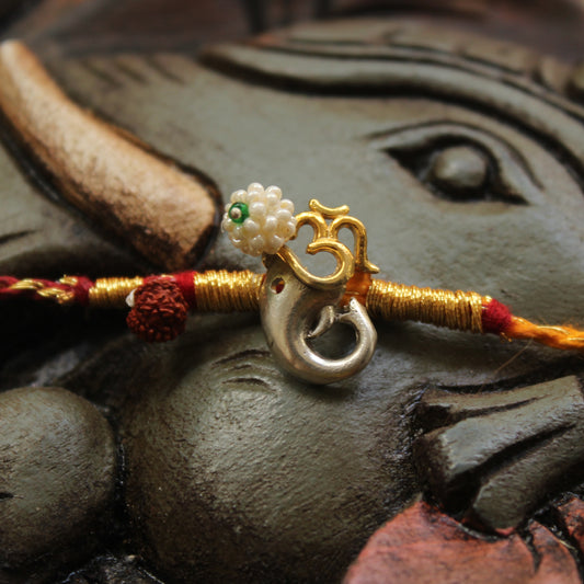 Om Ganesh Rakhi + Lumba Set