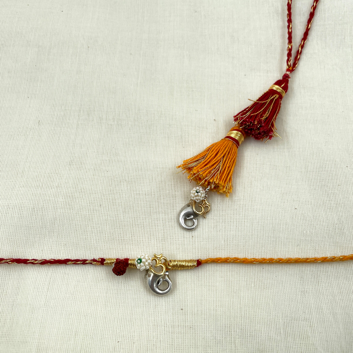 Om Ganesh Rakhi + Lumba Set